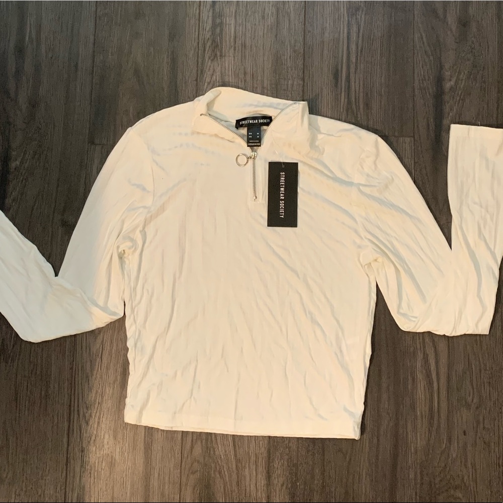 Super cute white long sleeve.